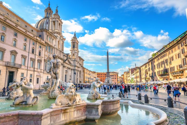 a group of people standing in front of Piazza Navona